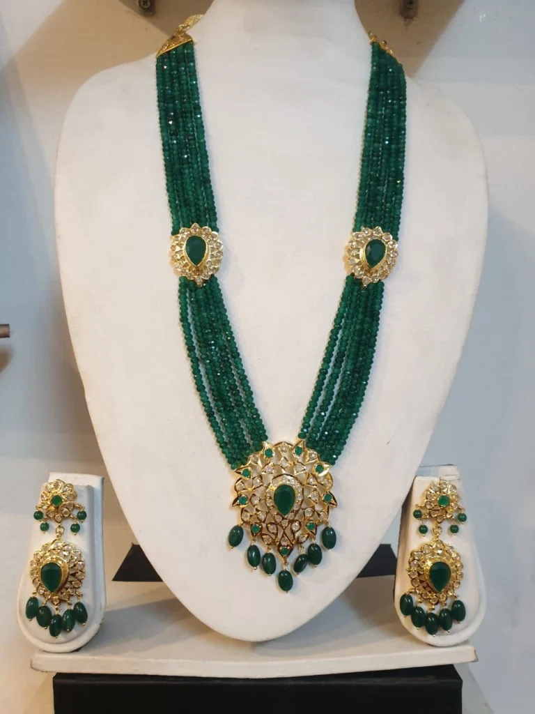 Handcrafted Green Rani Haar Set adorned with semi-precious pearls and gold-tone detailing