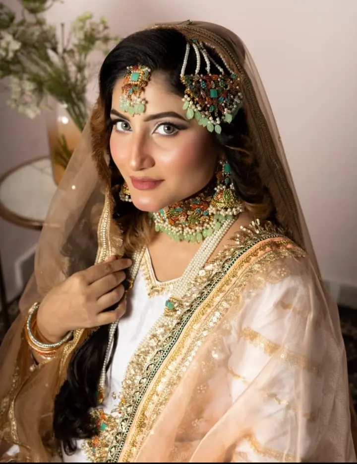 A woman wearing beautiful hyderabadi jewellery