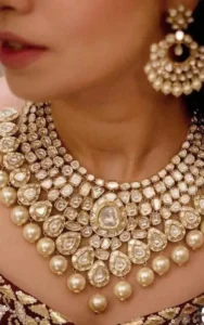 a model wearing beautiful jadau kundan jewellery