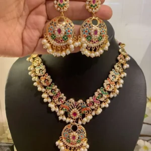 Insiya multicolour neck choker with pink, green, turquoise and pearl-white stones on a gold-plated base
