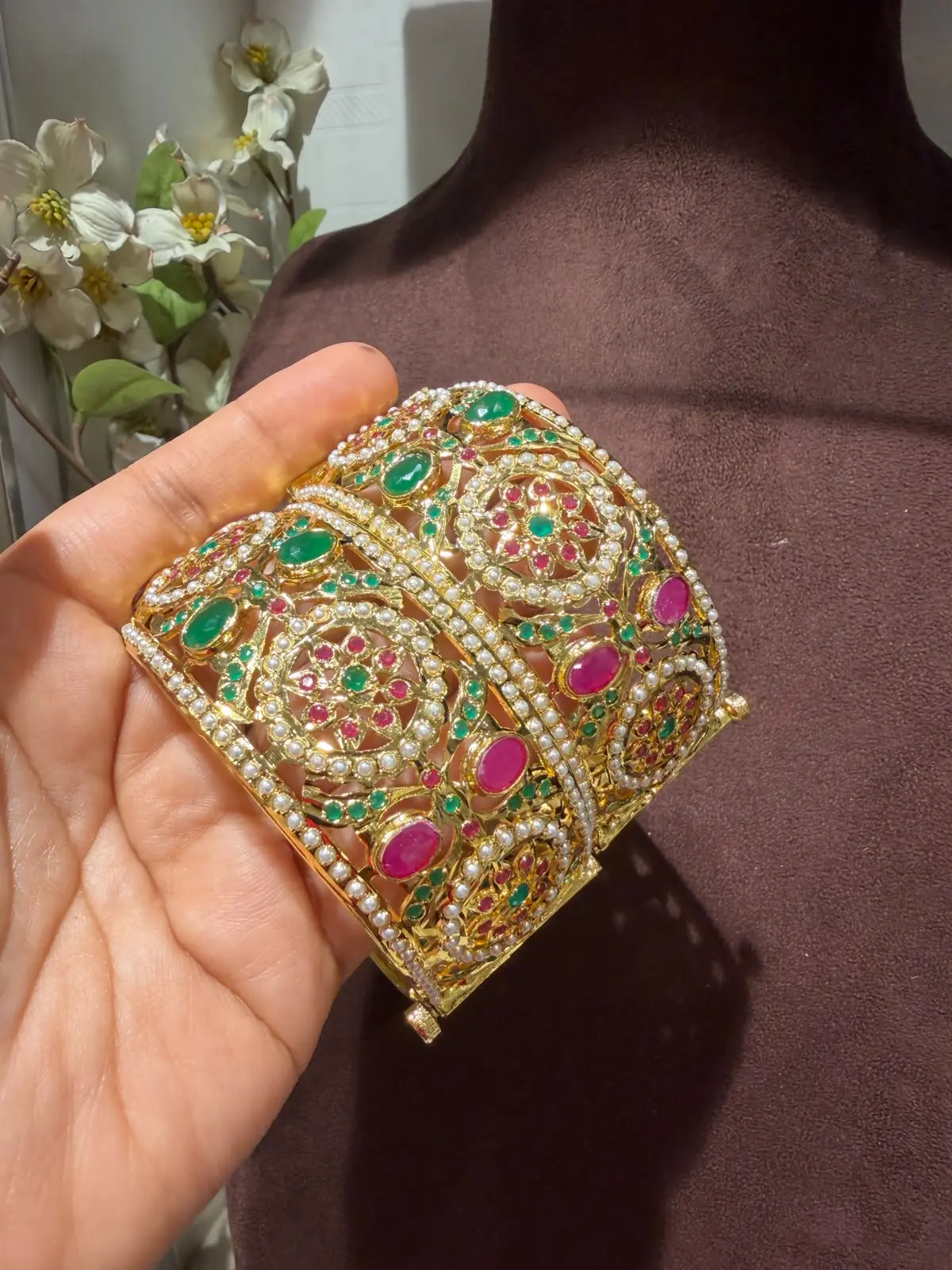 Taheera jadau bangles set with pink, green and white stones on gold plated finish